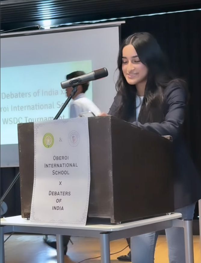 Giving the President's note at the Debaters of India and Oberoi International School WSDC